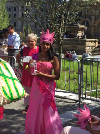 Code Pink “beauty queen” at Public Square Protest
